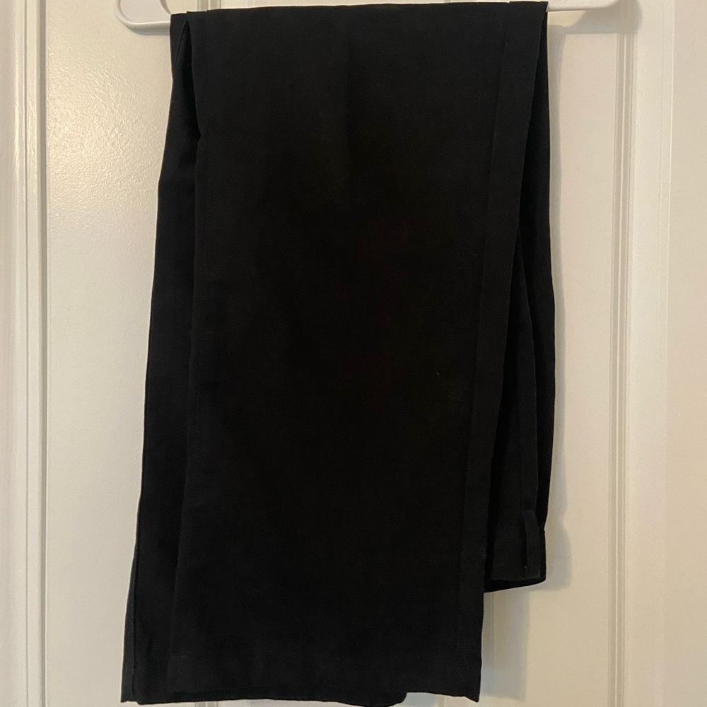Men’s black George pants.